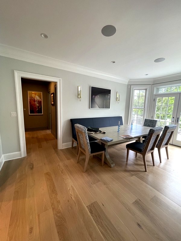 Elegant dining area with painted walls and natural light