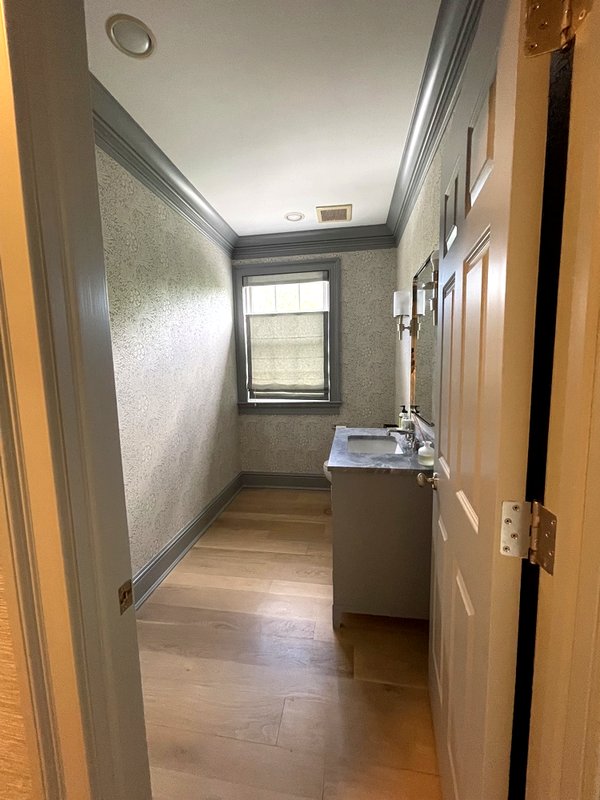 Bathroom interior with freshly painted walls in neutral tones
